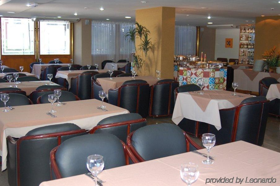 Like Ue Hotel Гояния Ресторант снимка